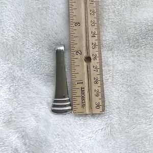 Vintage handle spoon pendant, silver, with ridges.